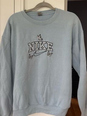 Nike Pale Blue Crewneck Sweatshirt with Butterfly Logo